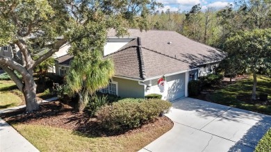 CHARMING SINGLE STORY HOME SITUATED ON AN OVERSIZED CONSERVATION on TPC of Tampa Bay in Florida - for sale on GolfHomes.com, golf home, golf lot