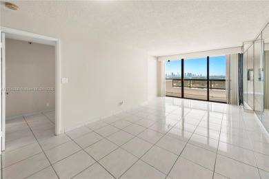 The *It* apartment with breathtaking views is for sale at a on Miami Beach Golf Club in Florida - for sale on GolfHomes.com, golf home, golf lot