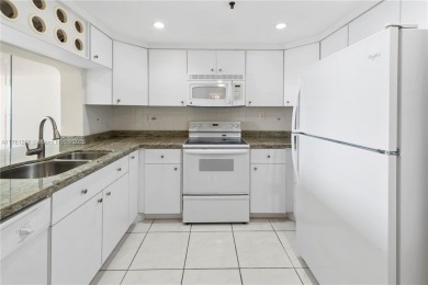 The *It* apartment with breathtaking views is for sale at a on Miami Beach Golf Club in Florida - for sale on GolfHomes.com, golf home, golf lot