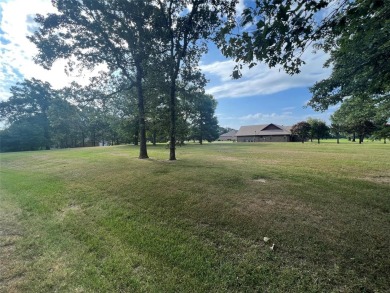 Discover the ideal setting for your new home on this charming on Lake Fork Golf Club - Wood County in Texas - for sale on GolfHomes.com, golf home, golf lot