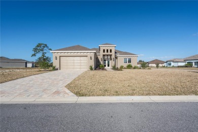 Welcome to the epitome of modern living in the prestigious Glen on Glen Lakes Country Club in Florida - for sale on GolfHomes.com, golf home, golf lot