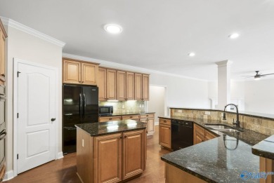 Nestled in one of Hampton Cove's most sought-after neighborhoods on Hampton Cove Golf Course in Alabama - for sale on GolfHomes.com, golf home, golf lot