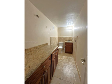 Welcome to the prestigious Country Club of Miami.   Rarely on Country Club of Miami in Florida - for sale on GolfHomes.com, golf home, golf lot
