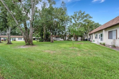 This END UNIT with 2 BEDROOMS, 2 FULL BATHS condo that includes on Highland Lakes Executive Golf Course in Florida - for sale on GolfHomes.com, golf home, golf lot