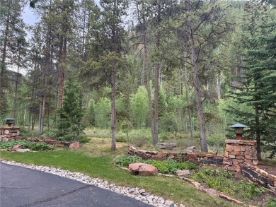 Discover the beauty and seclusion of Lot 59, a rare opportunity on The River Course At Keystone in Colorado - for sale on GolfHomes.com, golf home, golf lot
