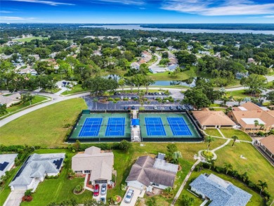 This END UNIT with 2 BEDROOMS, 2 FULL BATHS condo that includes on Highland Lakes Executive Golf Course in Florida - for sale on GolfHomes.com, golf home, golf lot