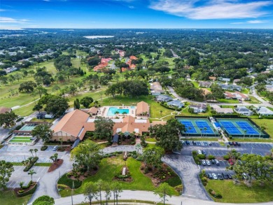 This END UNIT with 2 BEDROOMS, 2 FULL BATHS condo that includes on Highland Lakes Executive Golf Course in Florida - for sale on GolfHomes.com, golf home, golf lot
