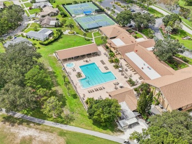 This END UNIT with 2 BEDROOMS, 2 FULL BATHS condo that includes on Highland Lakes Executive Golf Course in Florida - for sale on GolfHomes.com, golf home, golf lot