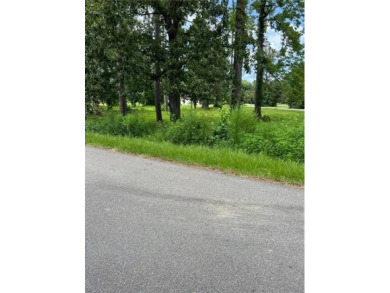 Beautiful wooded golf course lot in highly sought after on Covington Country Club in Louisiana - for sale on GolfHomes.com, golf home, golf lot