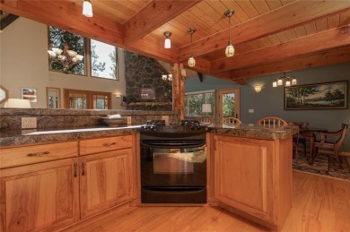 This quintessential Breckenridge home is nestled on a on Breckenridge Golf Club in Colorado - for sale on GolfHomes.com, golf home, golf lot