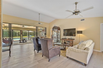 Welcome to this beautifully upgraded 3-bedroom, 3-bathroom home on Peridia Golf and Country Club in Florida - for sale on GolfHomes.com, golf home, golf lot