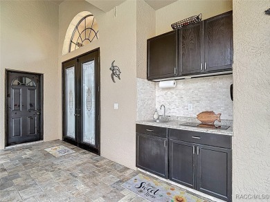 Stunning 3 bedrooms + office, 3 bath + 3 car garage Cabana Pool on Sugarmill Woods Golf and Country Club in Florida - for sale on GolfHomes.com, golf home, golf lot