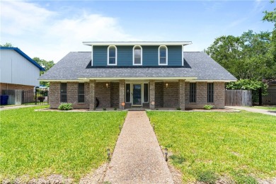 Located in the heart of Corpus Christi, this spacious two-story on Corpus Christi Country Club Golf Course in Texas - for sale on GolfHomes.com, golf home, golf lot