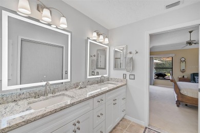 Welcome to this beautifully upgraded 3-bedroom, 3-bathroom home on Peridia Golf and Country Club in Florida - for sale on GolfHomes.com, golf home, golf lot