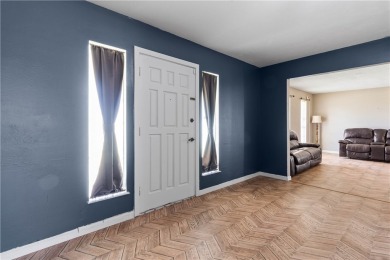 Located in the heart of Corpus Christi, this spacious two-story on Corpus Christi Country Club Golf Course in Texas - for sale on GolfHomes.com, golf home, golf lot