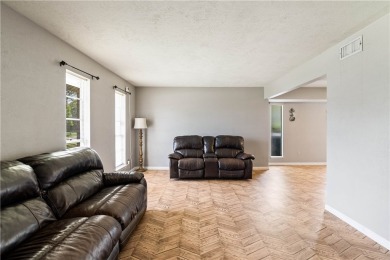 Located in the heart of Corpus Christi, this spacious two-story on Corpus Christi Country Club Golf Course in Texas - for sale on GolfHomes.com, golf home, golf lot