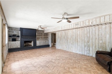 Located in the heart of Corpus Christi, this spacious two-story on Corpus Christi Country Club Golf Course in Texas - for sale on GolfHomes.com, golf home, golf lot