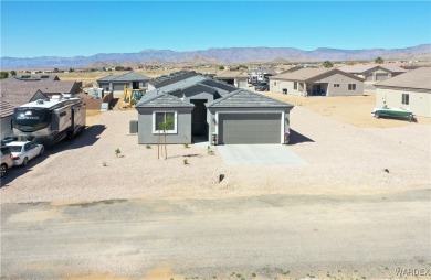Don't miss your opportunity to own this like-new construction on Valle Vista Golf Course in Arizona - for sale on GolfHomes.com, golf home, golf lot
