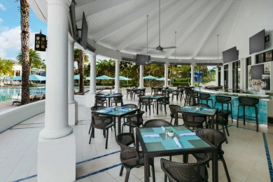Experience luxury living in this expansive penthouse condo on Broken Sound Golf and Club  in Florida - for sale on GolfHomes.com, golf home, golf lot