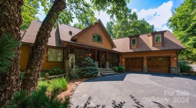 Nestled on 2.4 serene acres, this inviting retreat beckons you on Smoky Mountain Country Club in North Carolina - for sale on GolfHomes.com, golf home, golf lot