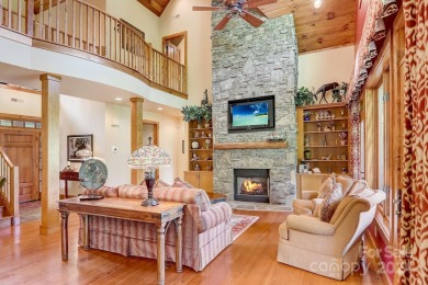 Nestled on 2.4 serene acres, this inviting retreat beckons you on Smoky Mountain Country Club in North Carolina - for sale on GolfHomes.com, golf home, golf lot