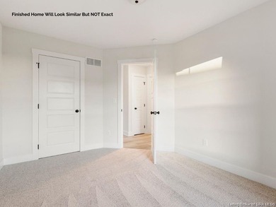 4 Bedrooms, 3 FULL Baths with a finished, rear WALKOUT lower on Covered Bridge Golf Club in Indiana - for sale on GolfHomes.com, golf home, golf lot