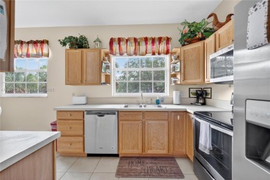 Lovely villa located in PGA Village's Castle Pines community on The Legacy Golf and Tennis Club in Florida - for sale on GolfHomes.com, golf home, golf lot