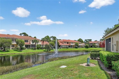Lovely villa located in PGA Village's Castle Pines community on The Legacy Golf and Tennis Club in Florida - for sale on GolfHomes.com, golf home, golf lot