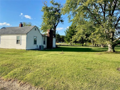 If you are looking for a great building spot with utilities on on Roland Barkau Memorial Golf Course in Illinois - for sale on GolfHomes.com, golf home, golf lot