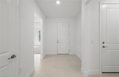 AVAILABLE NOW! This Summerwood plan is ready for move-in on River Hall Country Club in Florida - for sale on GolfHomes.com, golf home, golf lot