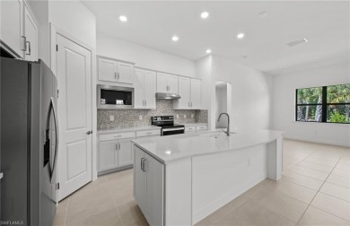 AVAILABLE NOW! This Summerwood plan is ready for move-in on River Hall Country Club in Florida - for sale on GolfHomes.com, golf home, golf lot