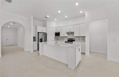 AVAILABLE NOW! This Summerwood plan is ready for move-in on River Hall Country Club in Florida - for sale on GolfHomes.com, golf home, golf lot