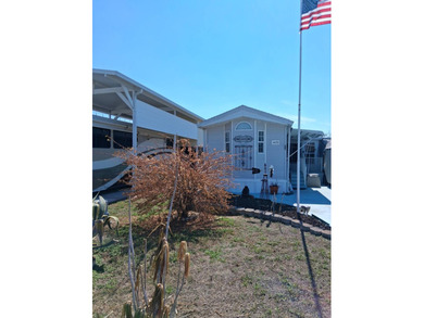 Furnished park model on .08 acre lot. Built in 1998 with an 18 on Deer Creek RV Golf Resort in Florida - for sale on GolfHomes.com, golf home, golf lot