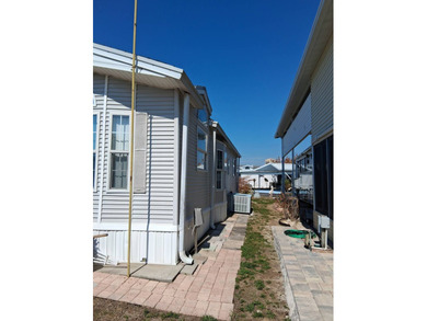 Furnished park model on .08 acre lot. Built in 1998 with an 18 on Deer Creek RV Golf Resort in Florida - for sale on GolfHomes.com, golf home, golf lot