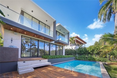 Prime turnkey residence nestled directly in front of the on La Gorce Country Club in Florida - for sale on GolfHomes.com, golf home, golf lot