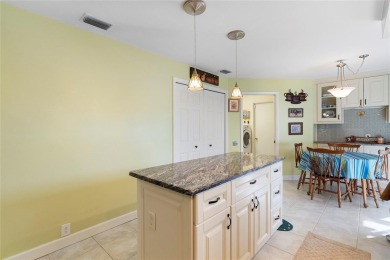 Greet the morning with breathtaking vistas and find solace in on Peridia Golf and Country Club in Florida - for sale on GolfHomes.com, golf home, golf lot