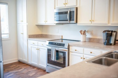 Welcome to the lake! This fully furnished condo at Mariners on Mariners Landing Golf and Country Club in Virginia - for sale on GolfHomes.com, golf home, golf lot