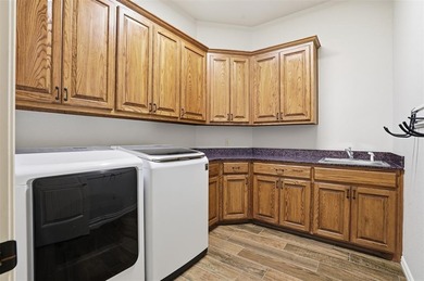 Located in DeCordova Bend Estates, this 2008 custom-built home on De Cordova Bend Country Club in Texas - for sale on GolfHomes.com, golf home, golf lot