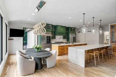 Set at the quiet end of an exclusive cul-de-sac, beyond a secure on Bobby Jones Golf Club in Georgia - for sale on GolfHomes.com, golf home, golf lot