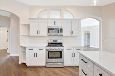 Welcome to this beautifully renovated 4-bedroom, 2.5-bathroom on The River Club in Florida - for sale on GolfHomes.com, golf home, golf lot