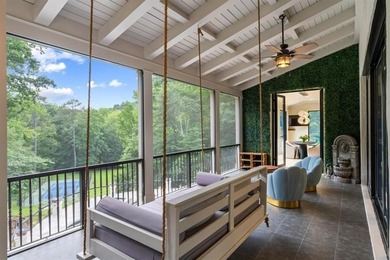 Set at the quiet end of an exclusive cul-de-sac, beyond a secure on Bobby Jones Golf Club in Georgia - for sale on GolfHomes.com, golf home, golf lot