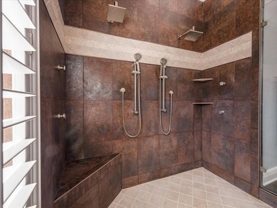 Tucked away on a quiet cul-de-sac, this exceptional on East Lake Woodlands Country Club in Florida - for sale on GolfHomes.com, golf home, golf lot