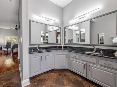 Tucked away on a quiet cul-de-sac, this exceptional on East Lake Woodlands Country Club in Florida - for sale on GolfHomes.com, golf home, golf lot