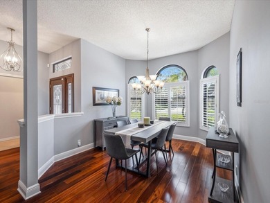 Tucked away on a quiet cul-de-sac, this exceptional on East Lake Woodlands Country Club in Florida - for sale on GolfHomes.com, golf home, golf lot