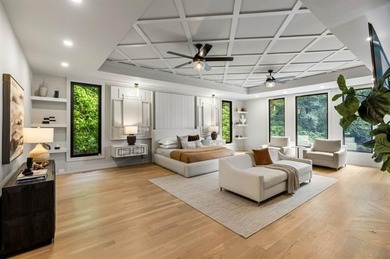 Set at the quiet end of an exclusive cul-de-sac, beyond a secure on Bobby Jones Golf Club in Georgia - for sale on GolfHomes.com, golf home, golf lot