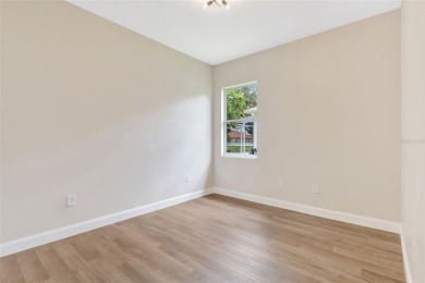 Welcome to this beautifully renovated 4-bedroom, 2.5-bathroom on The River Club in Florida - for sale on GolfHomes.com, golf home, golf lot