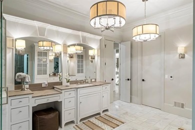 Set at the quiet end of an exclusive cul-de-sac, beyond a secure on Bobby Jones Golf Club in Georgia - for sale on GolfHomes.com, golf home, golf lot