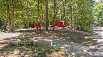 FIVE CAMP LOTS COMBINED INTO ONE BEAUTIFUL LAKE RETREAT!! One on River Golf and Country Club at Lake Royale in North Carolina - for sale on GolfHomes.com, golf home, golf lot