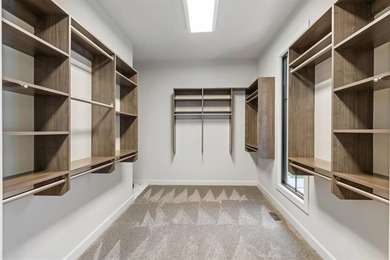 Set at the quiet end of an exclusive cul-de-sac, beyond a secure on Bobby Jones Golf Club in Georgia - for sale on GolfHomes.com, golf home, golf lot