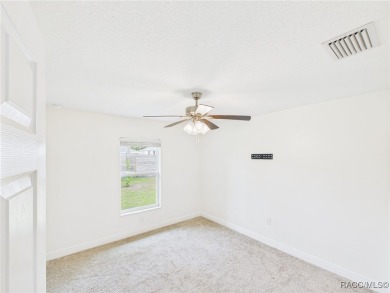 Welcome to 8199 W Oliver Drive in beautiful Citrus Springs on Citrus Springs Country Club in Florida - for sale on GolfHomes.com, golf home, golf lot